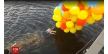 В Киеве парень на воздушных шарах пытался перелететь днепр